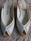 Vintage Bally white and beige sling backs